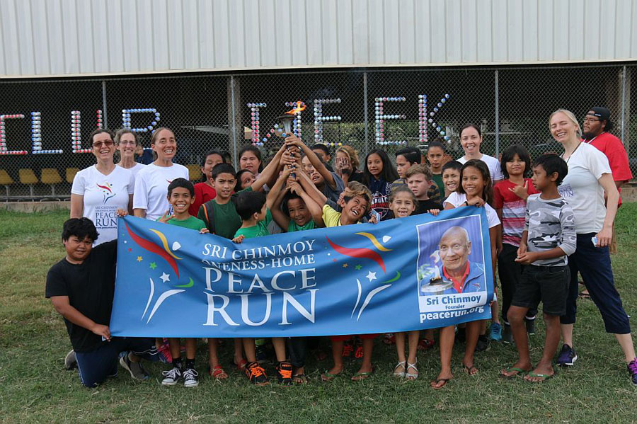 Visiting schools with the Peace Torch after the swim